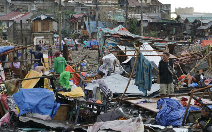 Cảnh tan hoang tại Philippines khi bão Rai đi qua