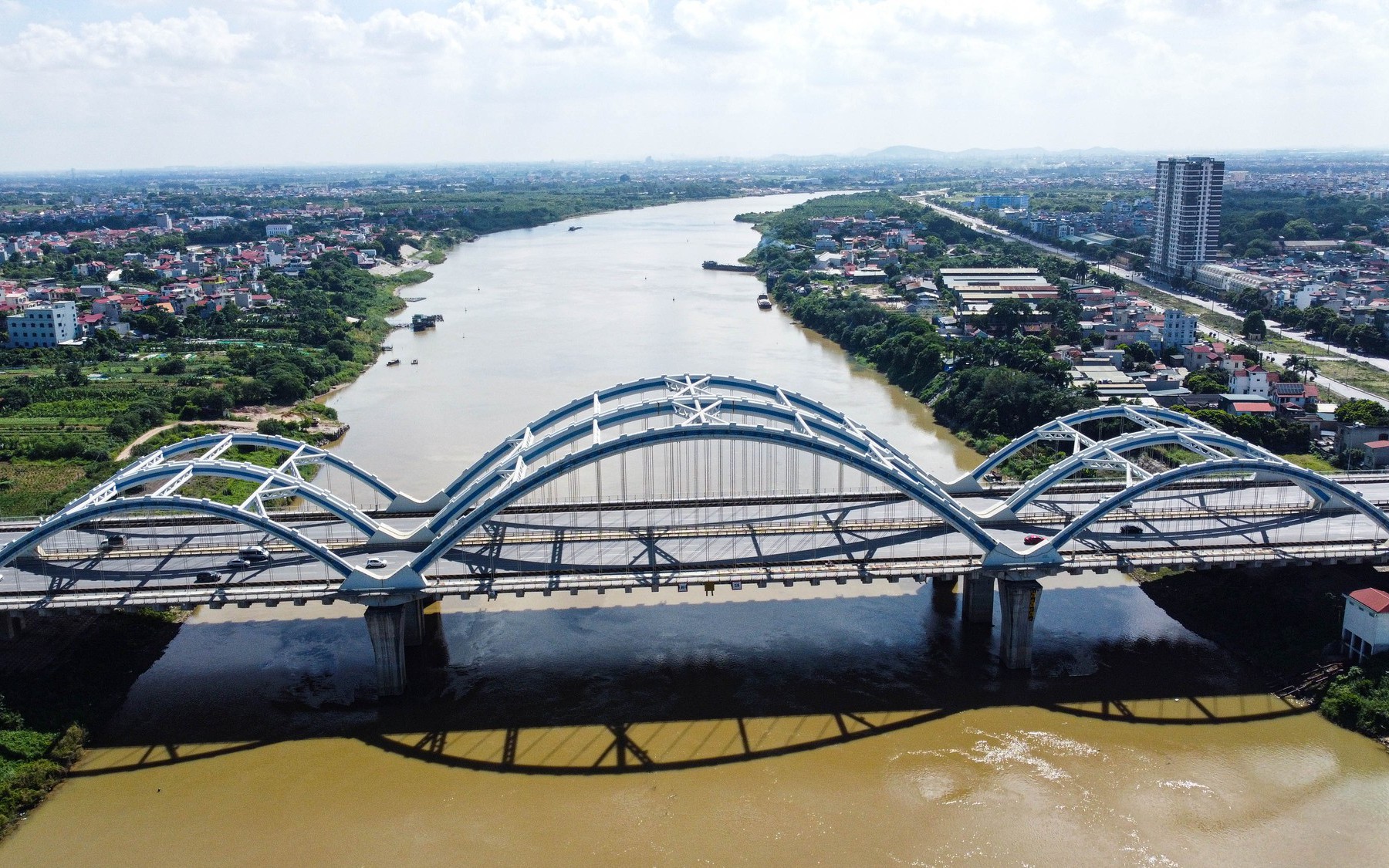 Chiêm ngưỡng cây cầu vòm thép vượt sông rộng nhất Việt Nam sau gần 10 năm đưa vào sử dụng